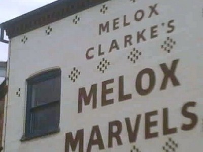 Old wall sign illustrating copywriting article