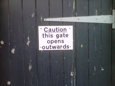 Odd gate sign illustrating article on copywriting